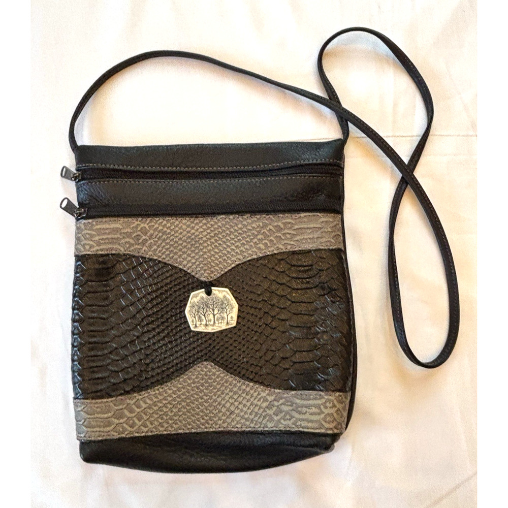 Hand made Tanner Creek black/brown leather crossbody with carved scrimshaw